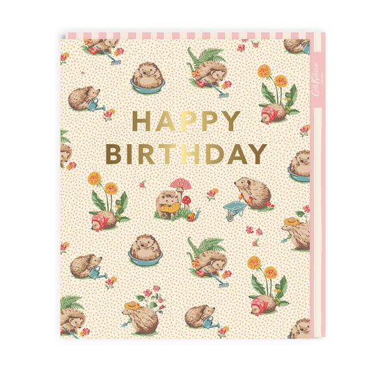 Birthday card with a cute hedgehogs illustration and gold foil lettering that reads Happy Birthday