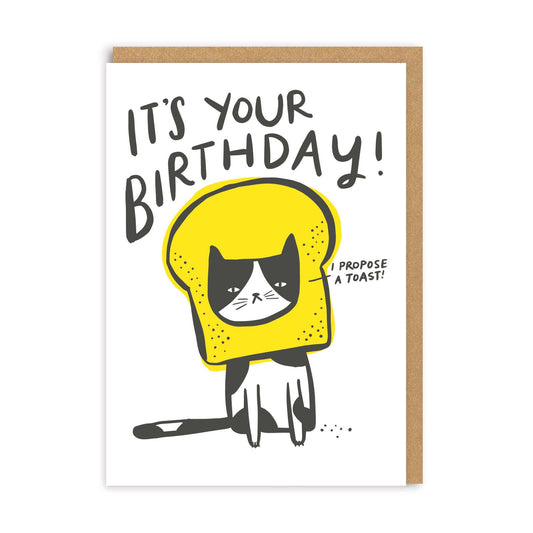 Birthday card with a cat in a toast hat and the caption I propose a toast