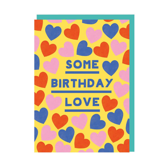 Yellow birthday card with red, blue and pink repeat heart pattern and text reading Some Birthday Love