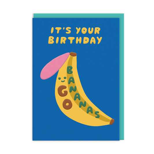 Solid blue background, with a groovy banana illustration including a smiley face, Text reads "It's your birthday go bananas'"