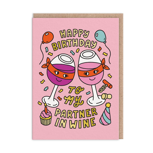 Pink Birthday Card with 2 clinking wine glasses. Gold foil text reads "Happy Birthday To My Partner In Wine"